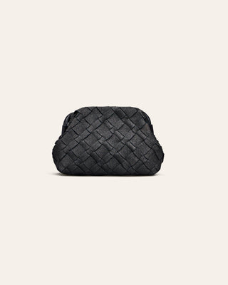 Cala Jade dark sparkling navy woven leather clutch on a light beige background