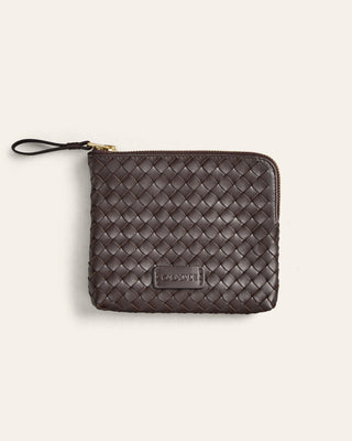 Woven leather pouch with a visible brand logo on a light beige background