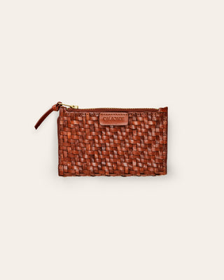 Cala Jadew Caia Nutmeg brown leather wallet on a beige background