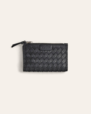Black woven leather pouch on a light gray background