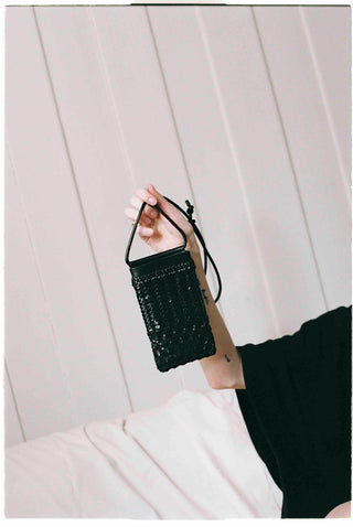 Cala Jade Mia Black leather Pouch on model