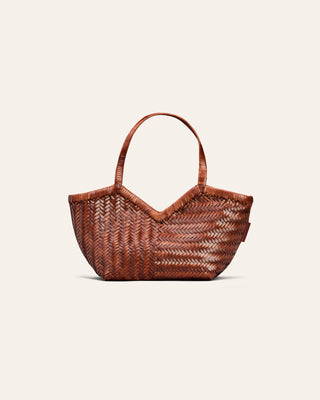 Cala Jade brown woven leather bag on a beige background