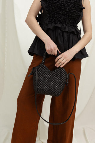 Cala Jade Maya leather bag on model 1