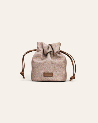 Cala Jade purple drawstring bag with brown leather strings on a light beige background
