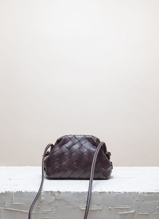 Cala Jade  braided leather clutch