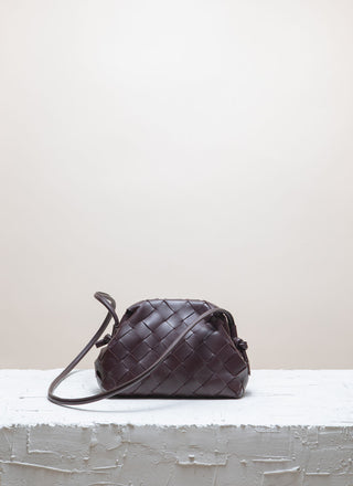 Cala Jade  braided leather clutch