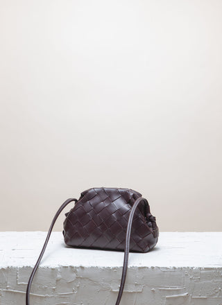 Cala Jade  braided leather clutch
