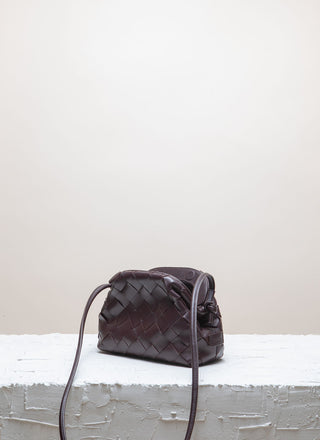 Cala Jade  braided leather clutch