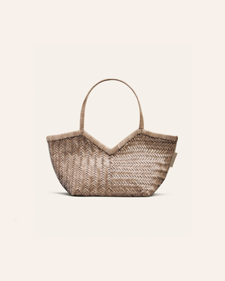 Cala Jade beige woven handbag on a beige background
