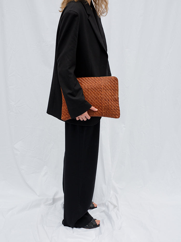 Cala Jade large leather pouch on model 2