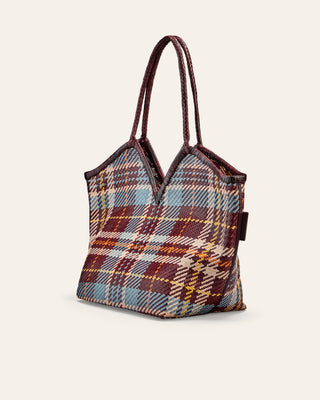 Plaid patterned bag on a white background