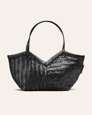 Cala Jade Black woven handbag on a beige background seen from the front