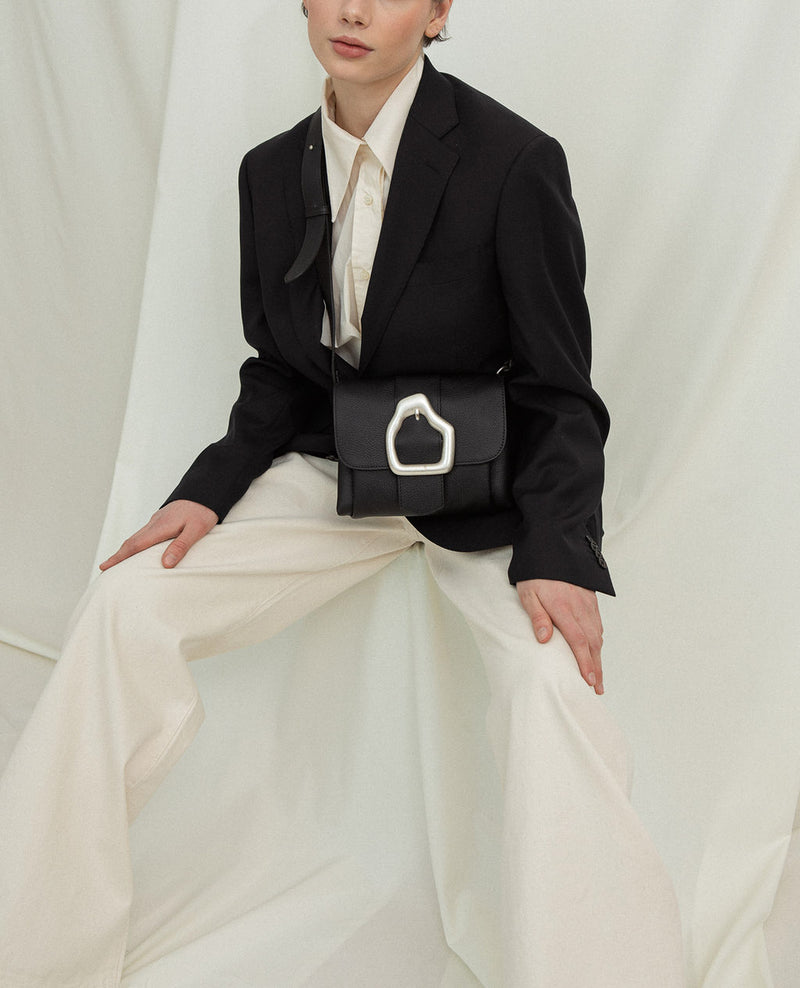Cala Jade Nami mini cross body bag on model