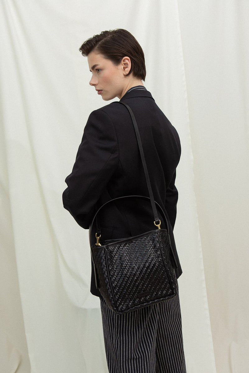 Cala Jade IWA mini leather bag on model