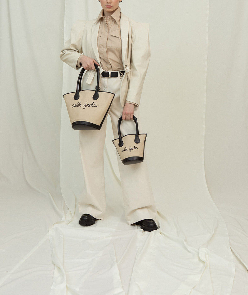 Cala Jade Sandhi beige canvs tote bag on model