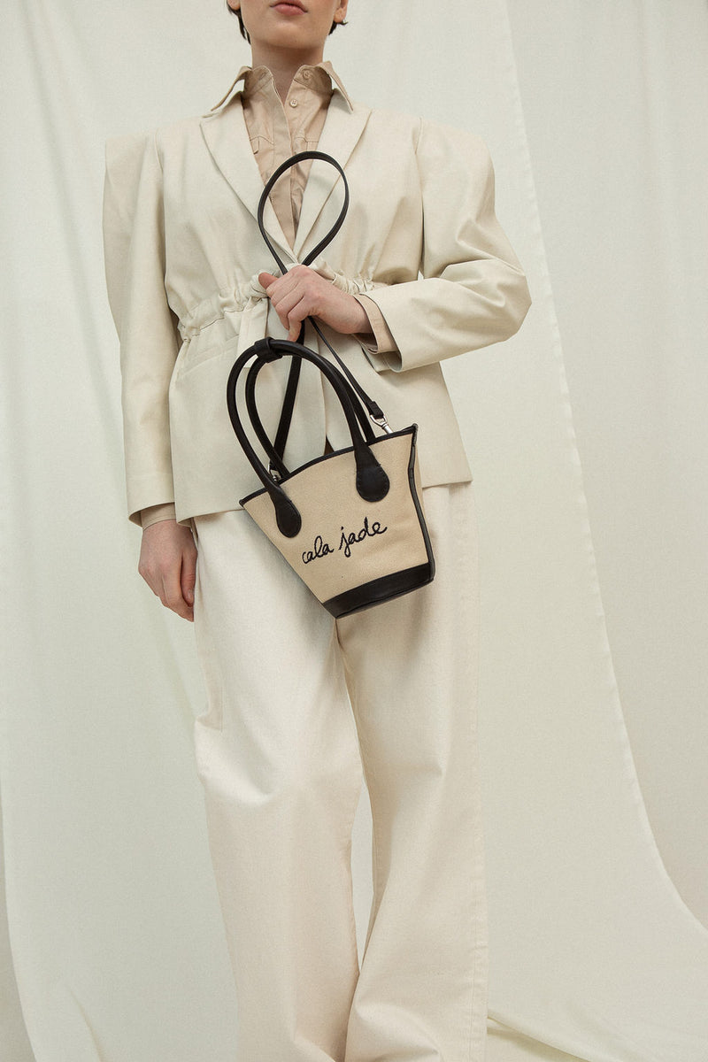 Cala Jade Sandhi beige canvas tote bag on model